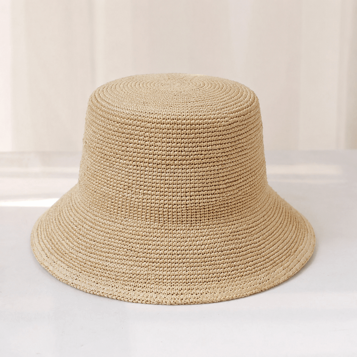 Ariel bøttehatt i raffia