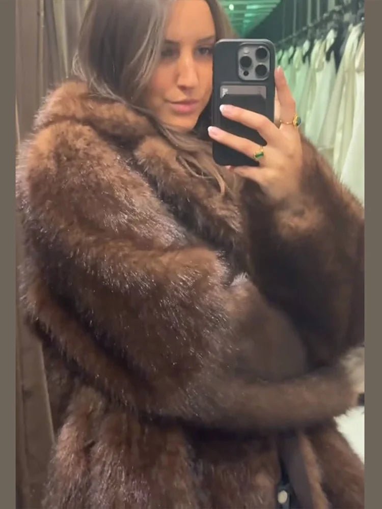 Jenny vendbar skinnjakke i imitert pels