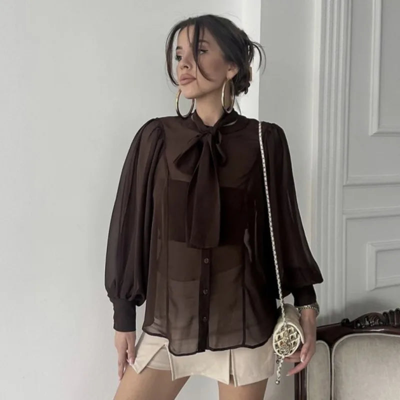 Flavia gjennomsiktig sløyfebluse