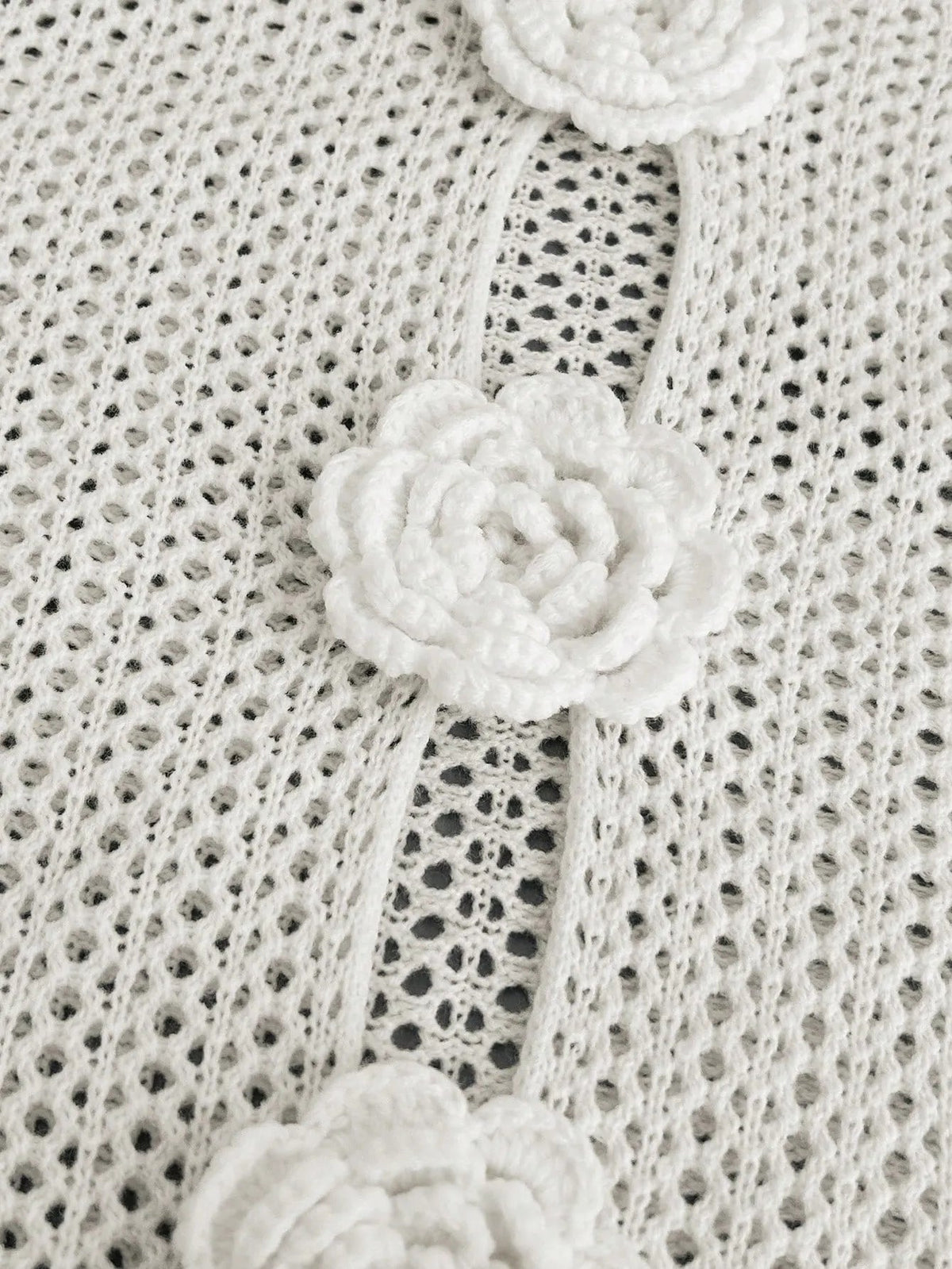 Marley heklet strandplagg med blomstermotiv