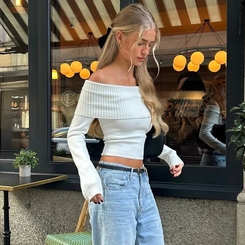 Nora genser med bare skuldre
