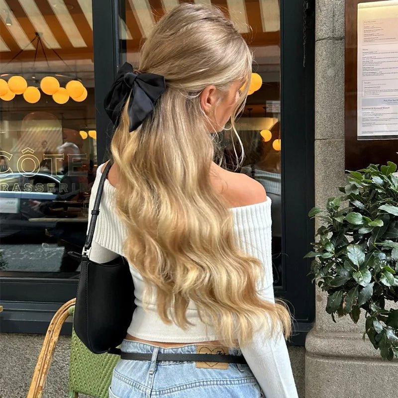 Nora genser med bare skuldre