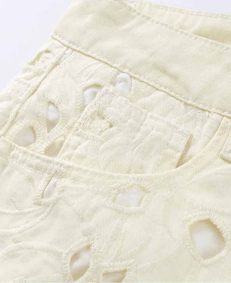 Rachel rette jeans i denim med høyt liv og utskjæringer