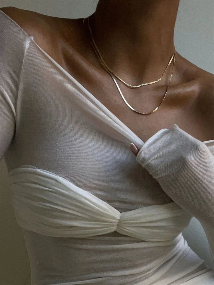 Sara gjennomsiktig mesh-topp med bare skuldre