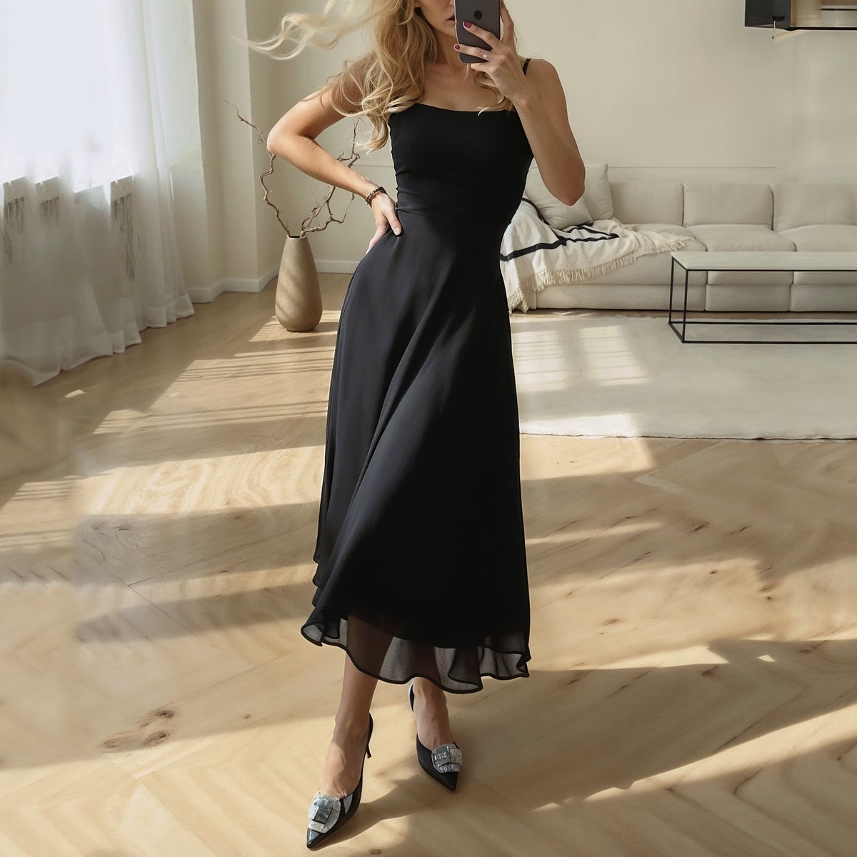 Sophia ermeløs midikjole