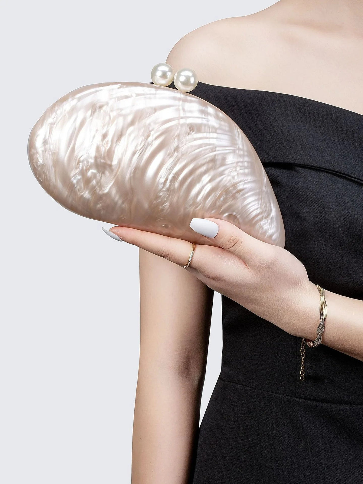 Valentina skjellformet clutchveske