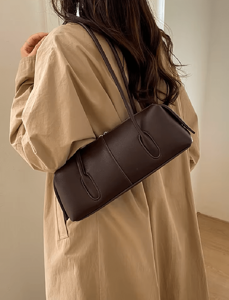 Mira Cylinder Shoulder Bag in dark brown – styled look
